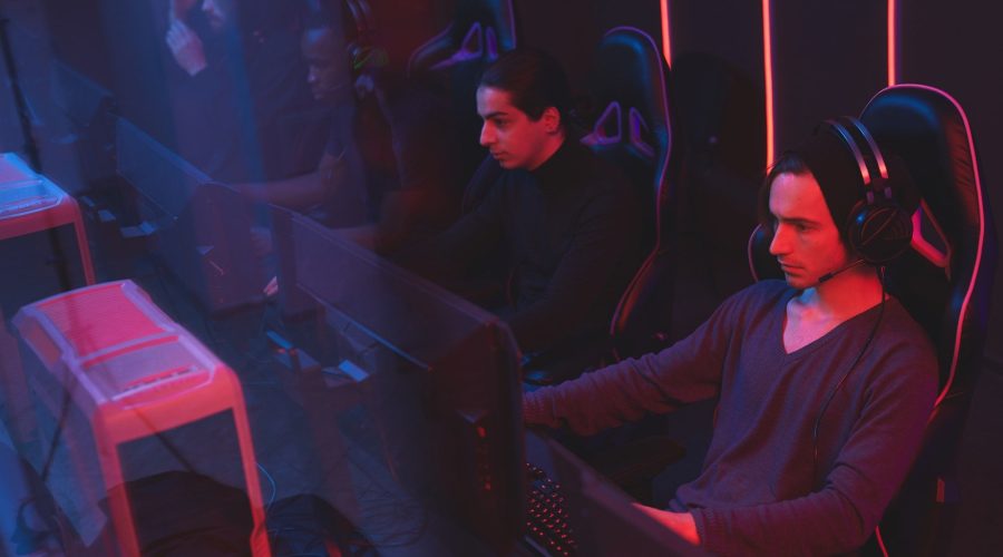 E-sport players in gaming cairs E-sport players in gaming cairs