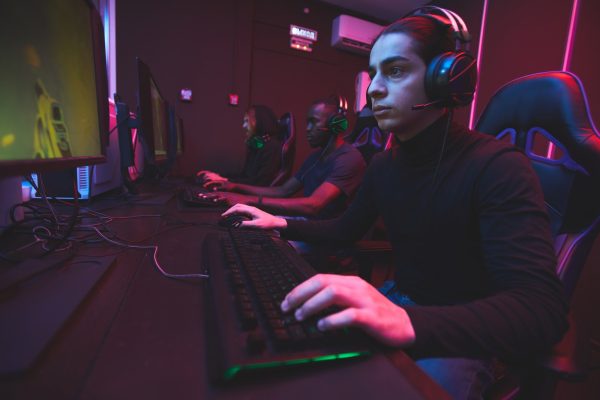 E-sports gamers on gaming chair E-sports gamers on gaming chair