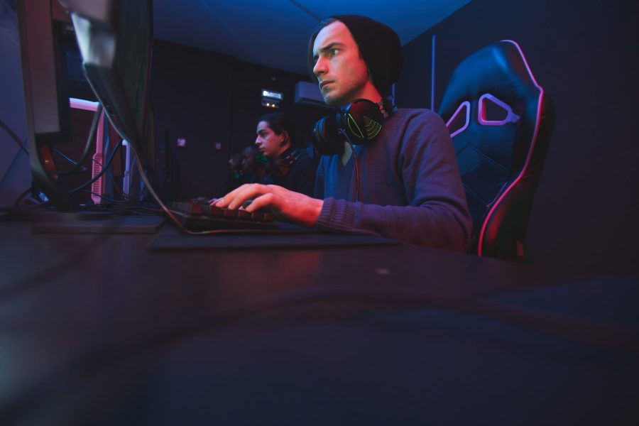 gamer in PC gaming chair gamer in PC gaming chair